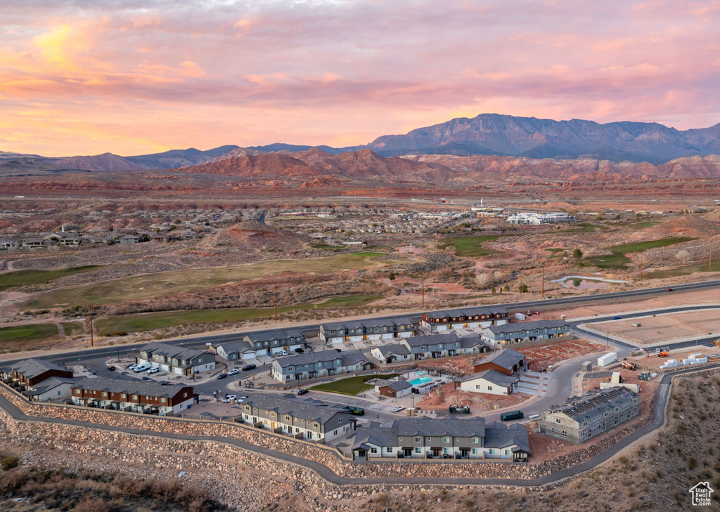 Aerial view of property's location featuring mountains