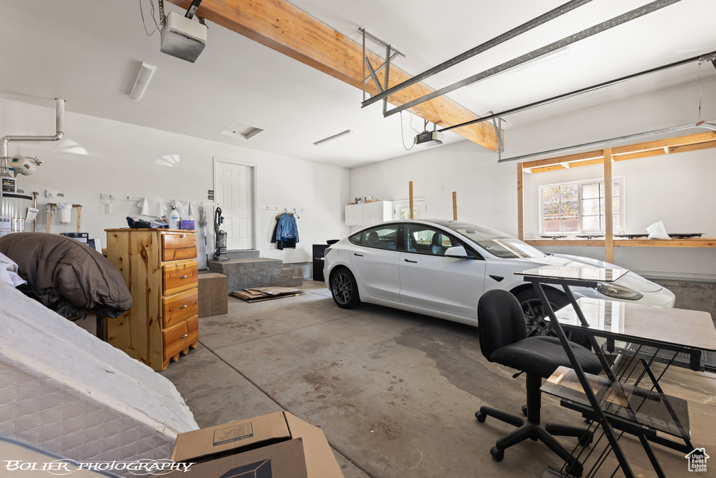 Garage featuring a garage door opener