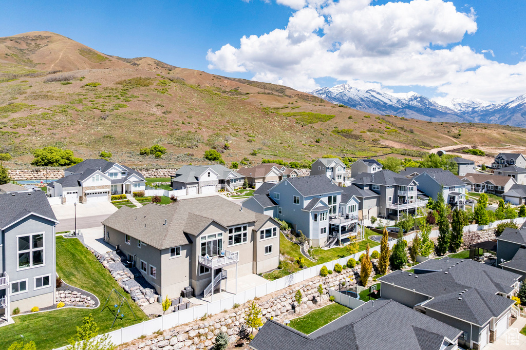 Aerial perspective of suburban area with mountains