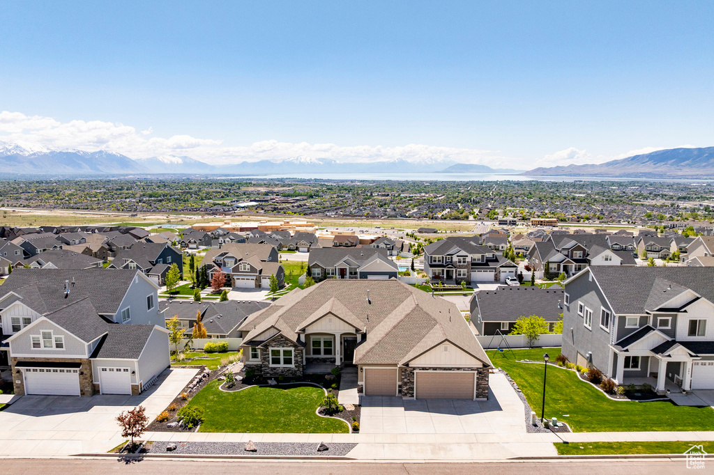 Aerial view of residential area with a mountainous background