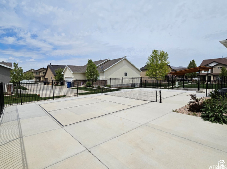 View of community with a residential view and fence