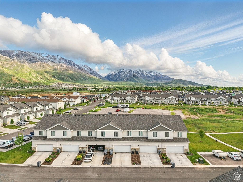 View of mountain backdrop with nearby suburban area