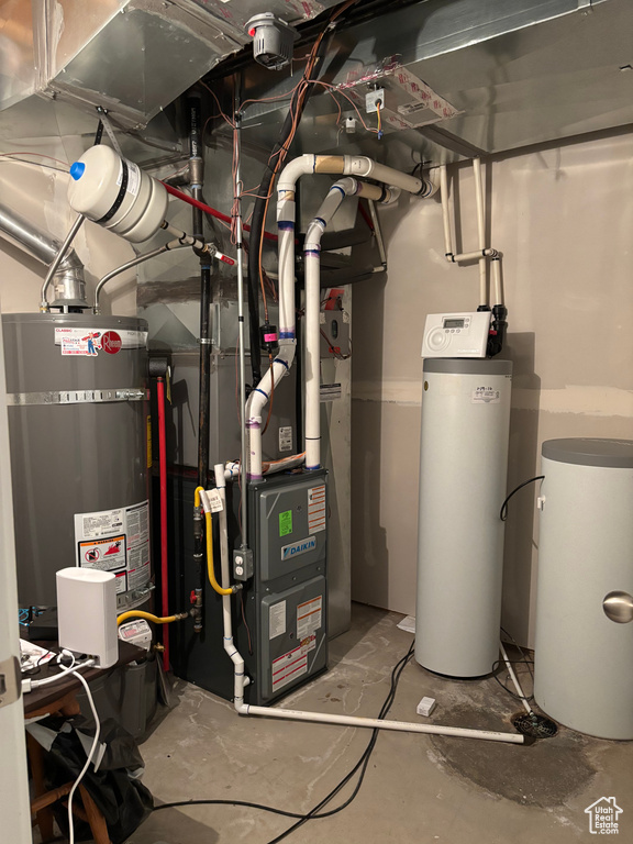 Utilities with strapped water heater