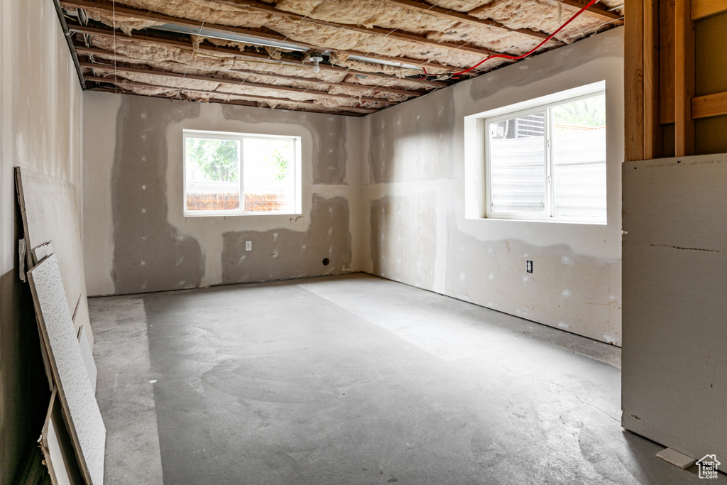 Unfurnished room featuring concrete floors
