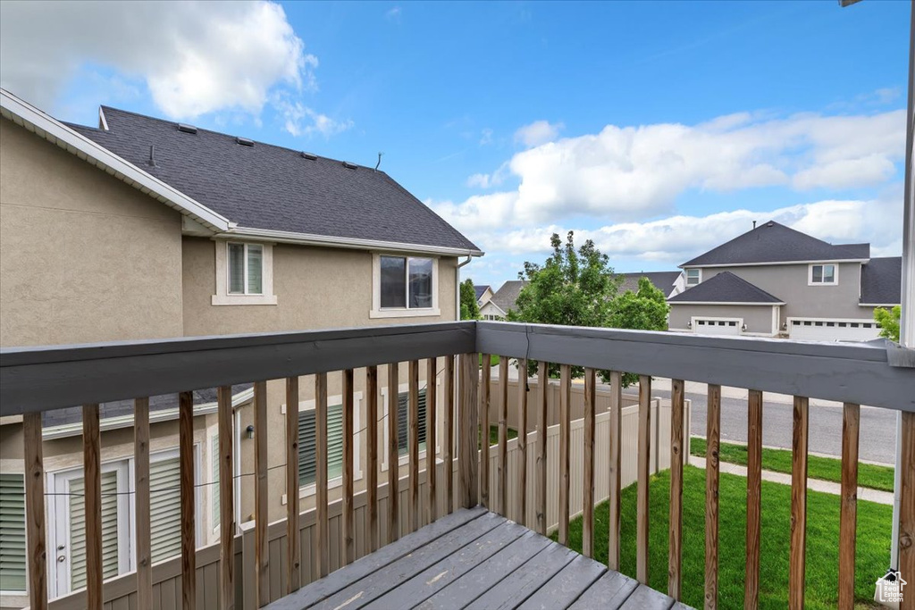 Wooden deck featuring a residential view