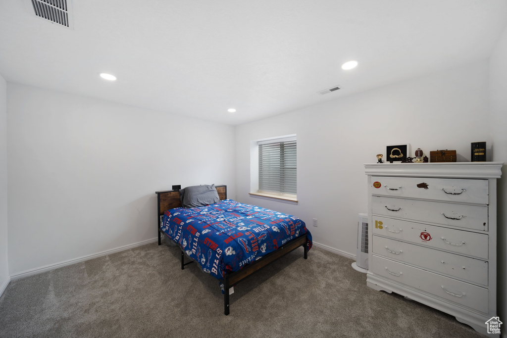 Bedroom featuring carpet, baseboards, and recessed lighting