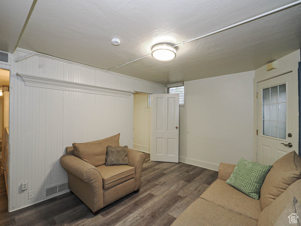 Living area featuring wood finished floors and baseboards