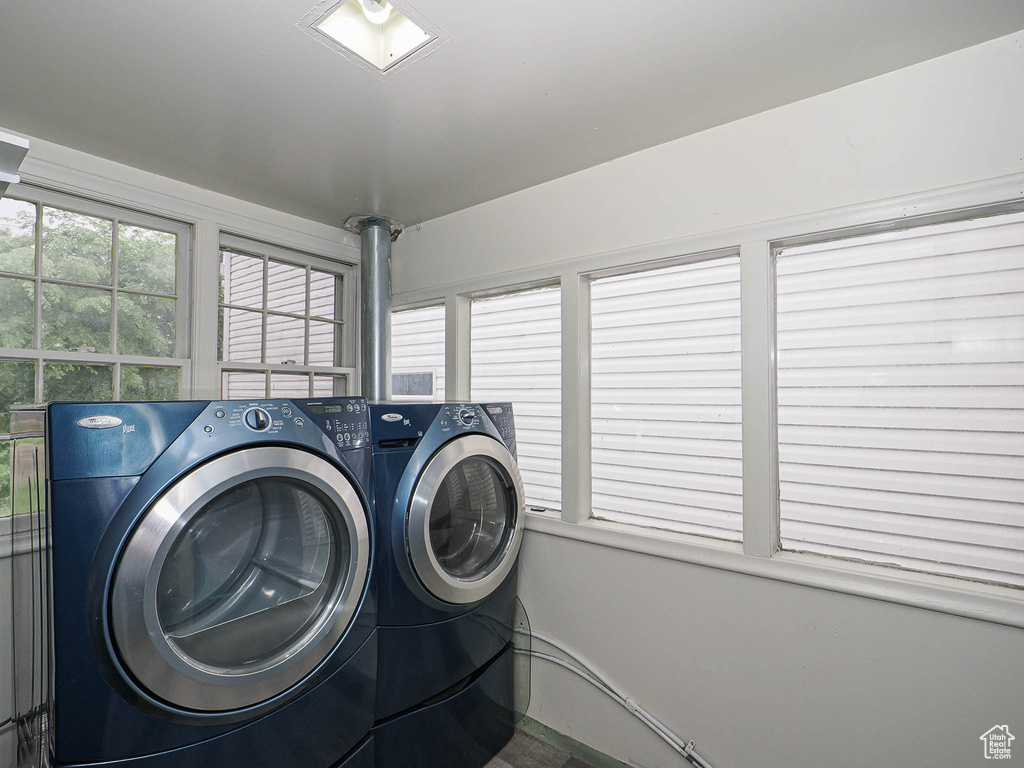 Washroom featuring washer and dryer