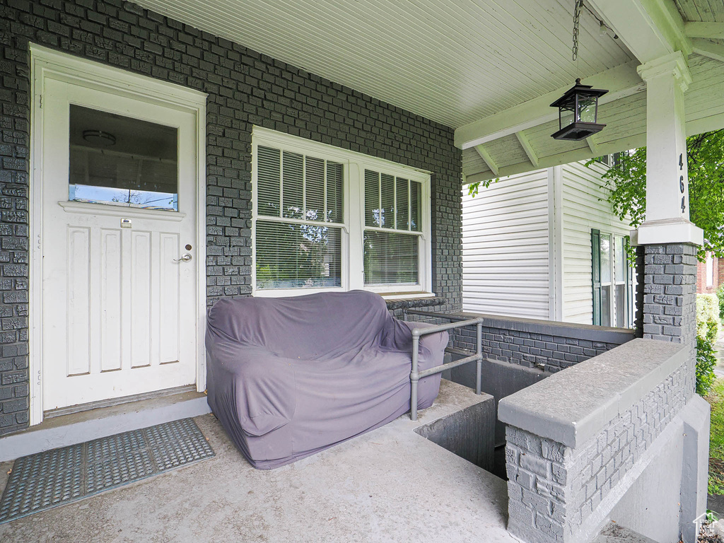 View of patio with covered porch