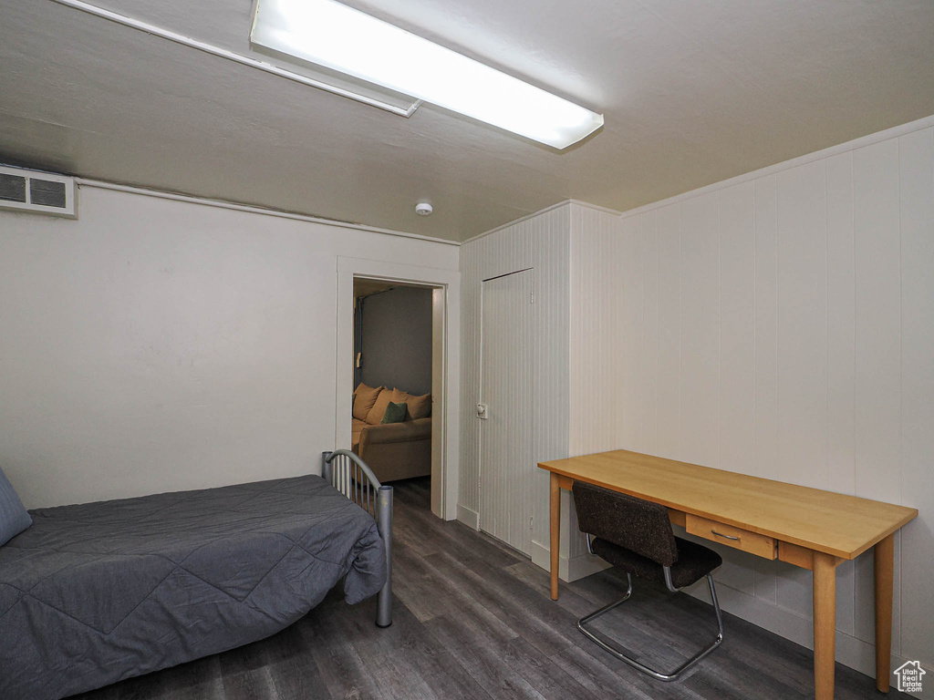 Bedroom featuring dark wood finished floors
