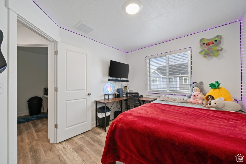 Bedroom featuring light wood finished floors