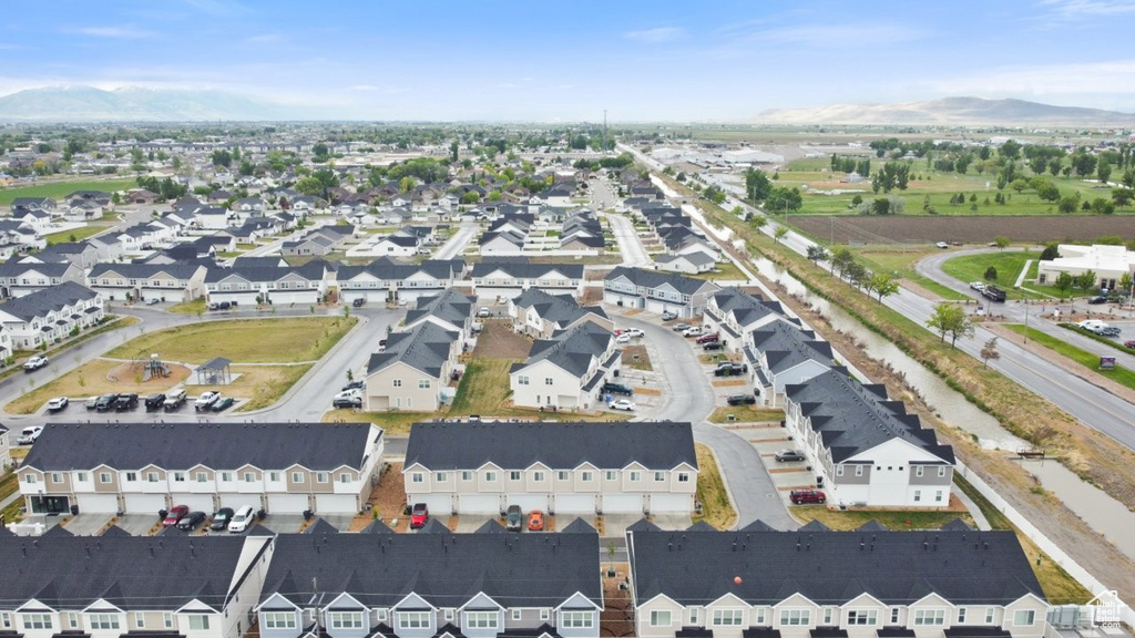 View of property location with a mountainous background and nearby suburban area