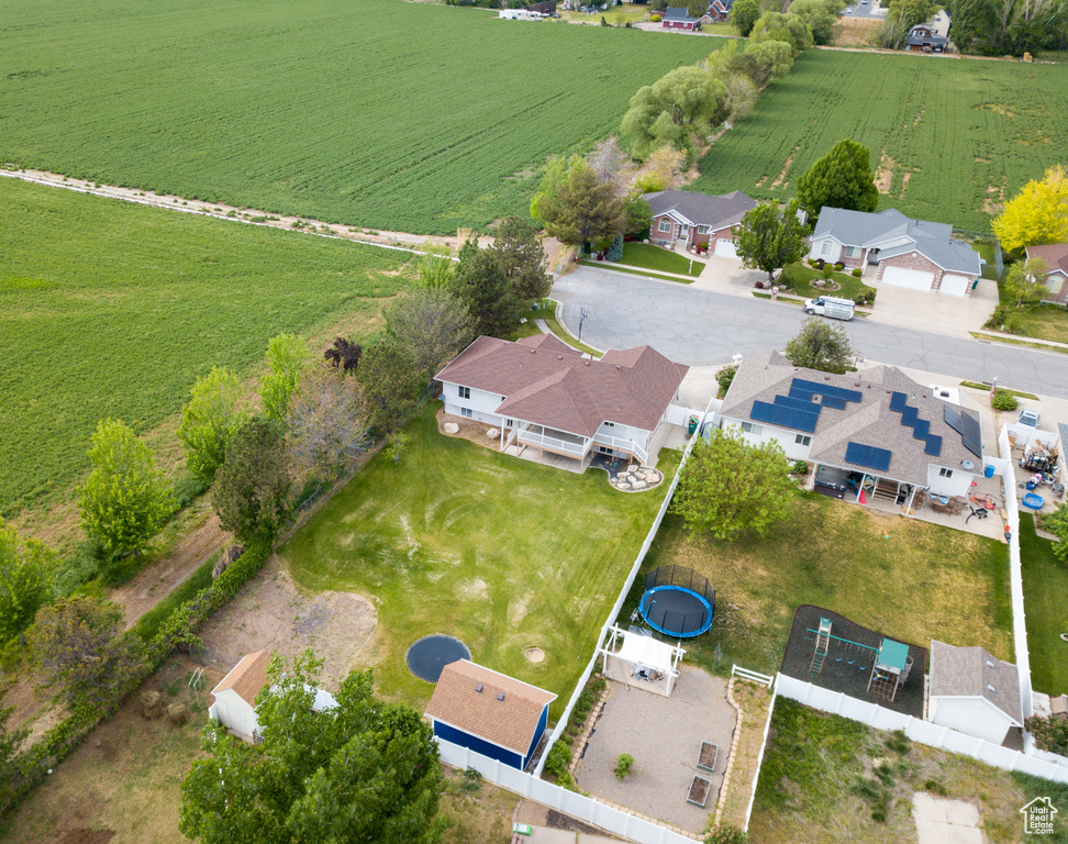 View of rural area featuring nearby suburban area