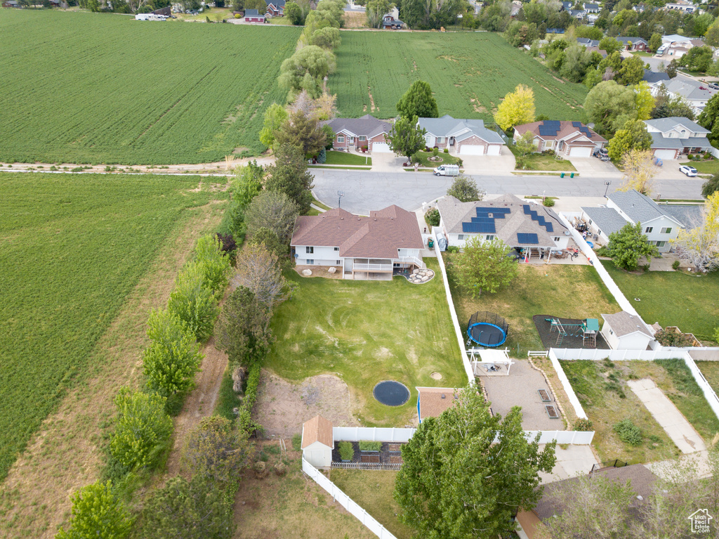 Aerial view of property\'s location featuring nearby suburban area