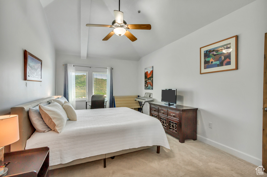 Bedroom featuring light colored carpet and a ceiling fan