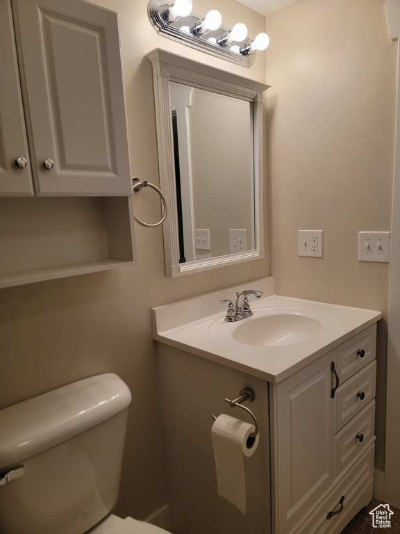 Bathroom featuring toilet and vanity