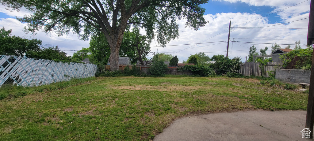 View of yard with fence