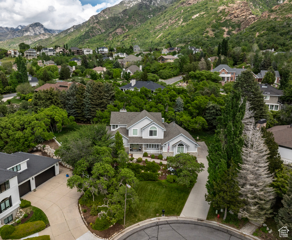 Aerial view of residential area with a mountain backdrop