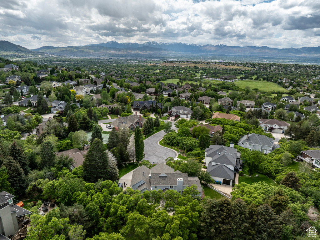 Aerial view of residential area with mountains