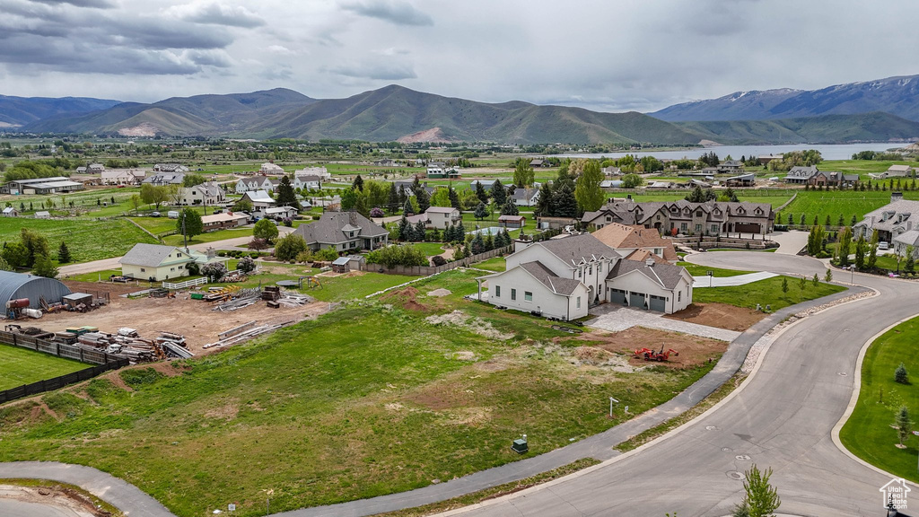 Aerial view of residential area with a water and mountain view