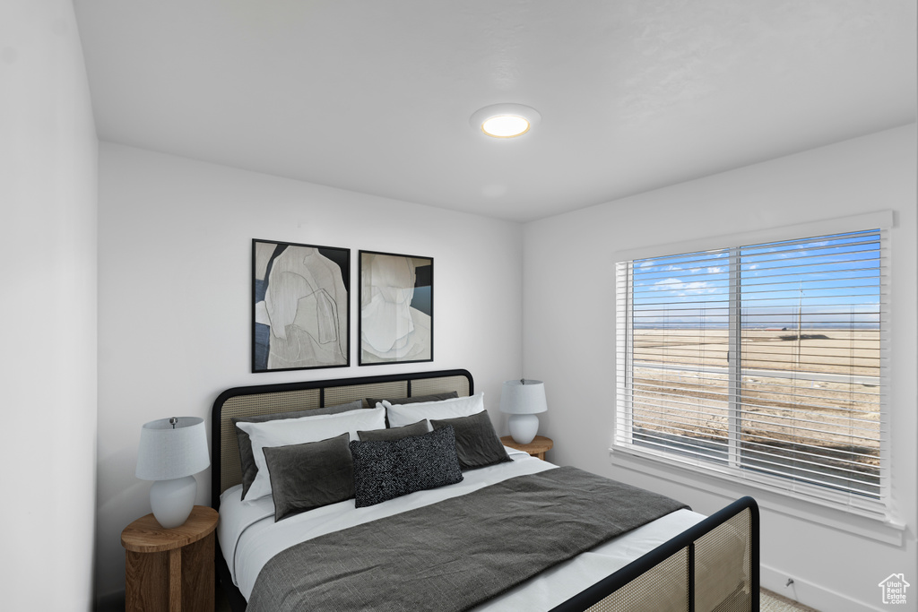 Bedroom featuring baseboards