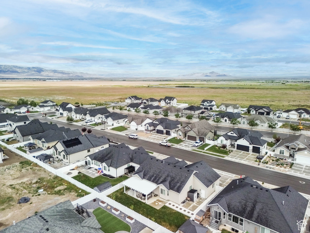 Aerial view of residential area with a mountain backdrop