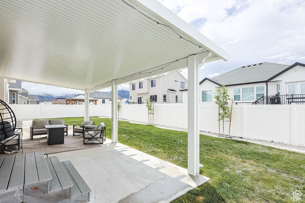 View of patio / terrace featuring an outdoor living space and a residential view