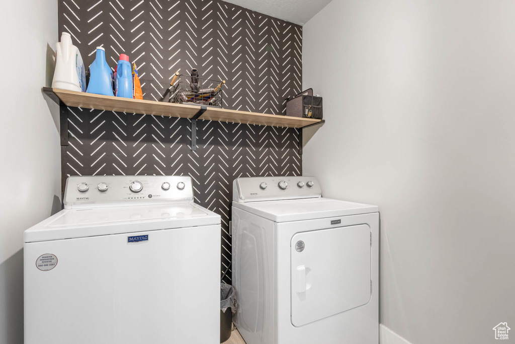 Clothes washing area with separate washer and dryer