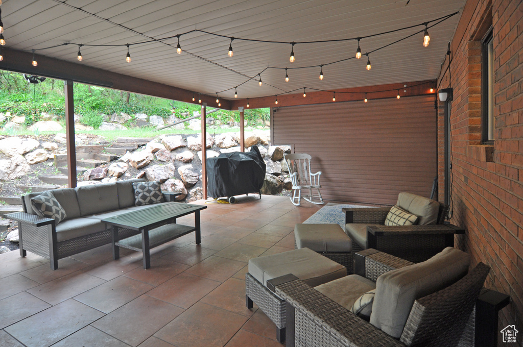 View of patio / terrace featuring an outdoor hangout area and area for grilling