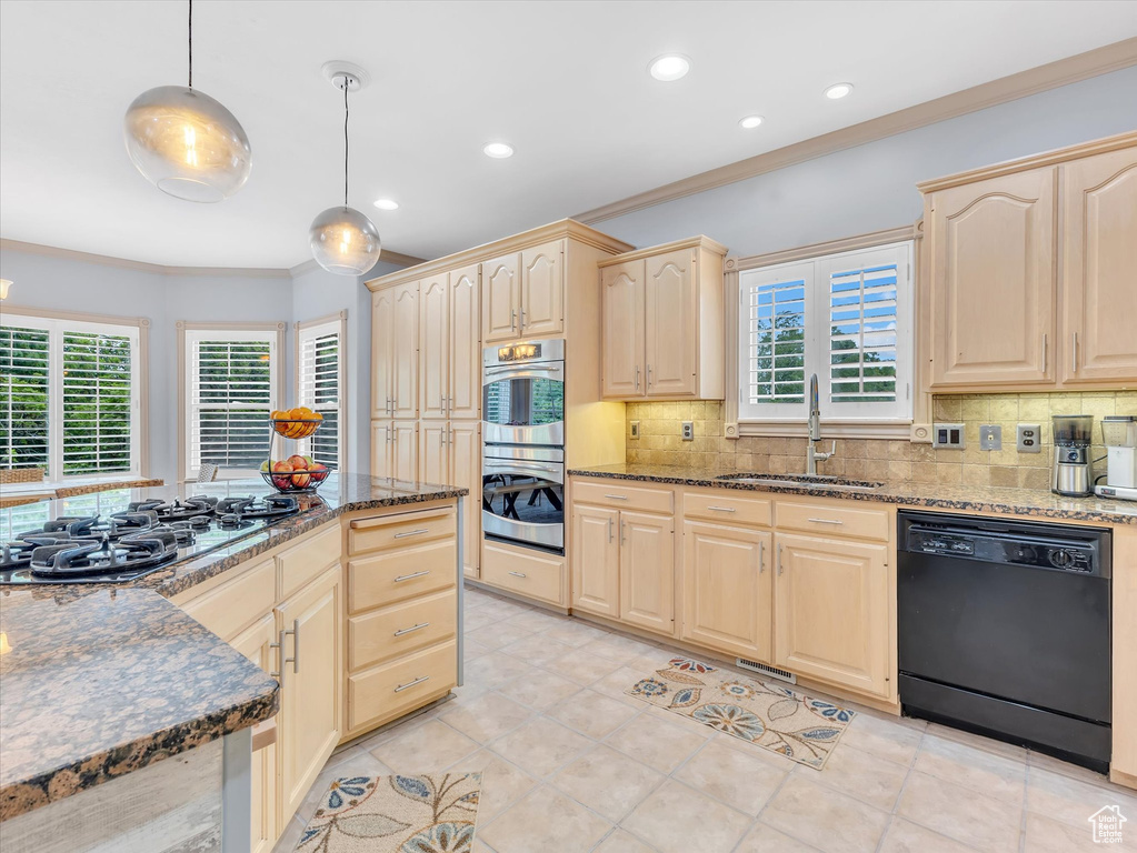 Kitchen with dishwasher, a sink, light brown cabinetry, crown molding, and recessed lighting