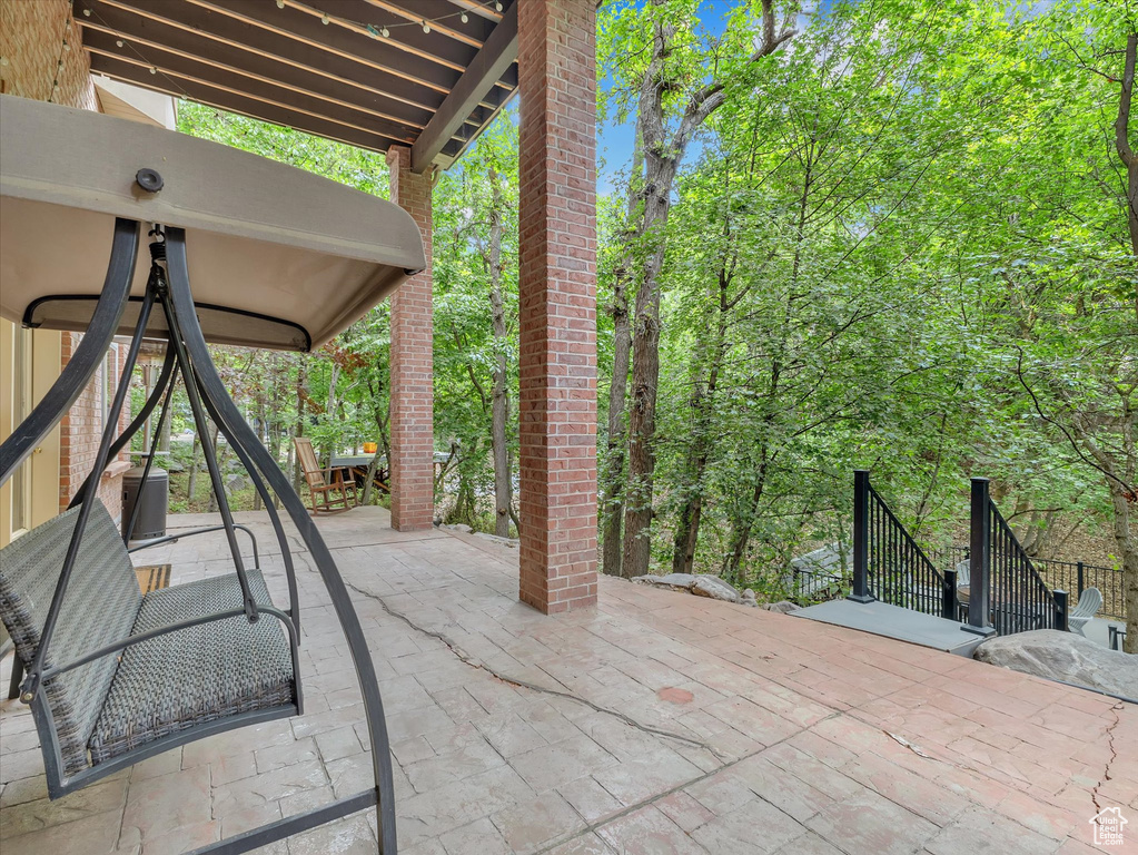 View of patio with stairs