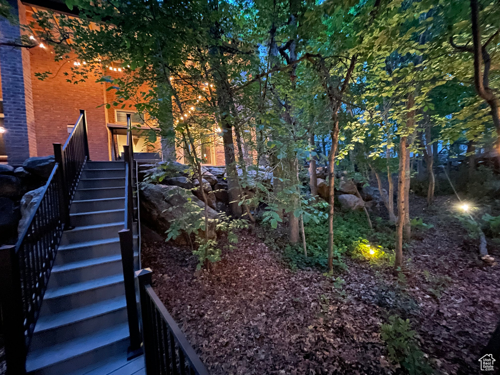 View of yard featuring stairs