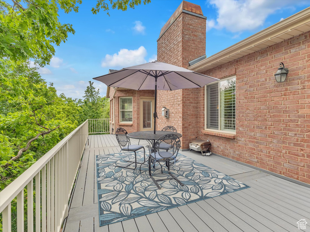 Wooden terrace with outdoor dining space