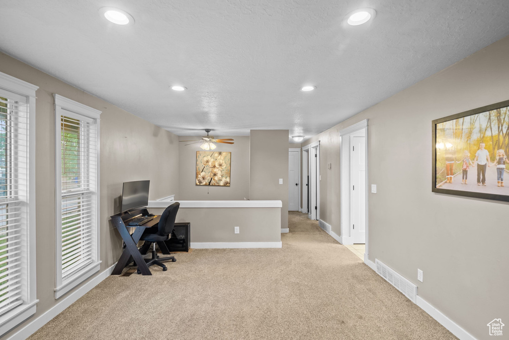 Office area featuring carpet flooring, recessed lighting, baseboards, and a ceiling fan