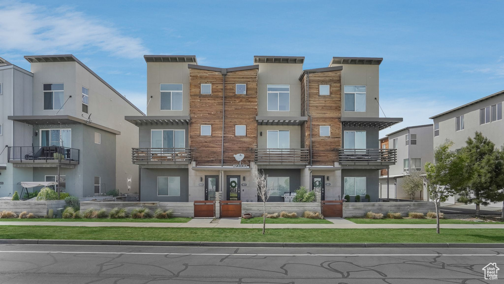 View of front facade with stucco siding