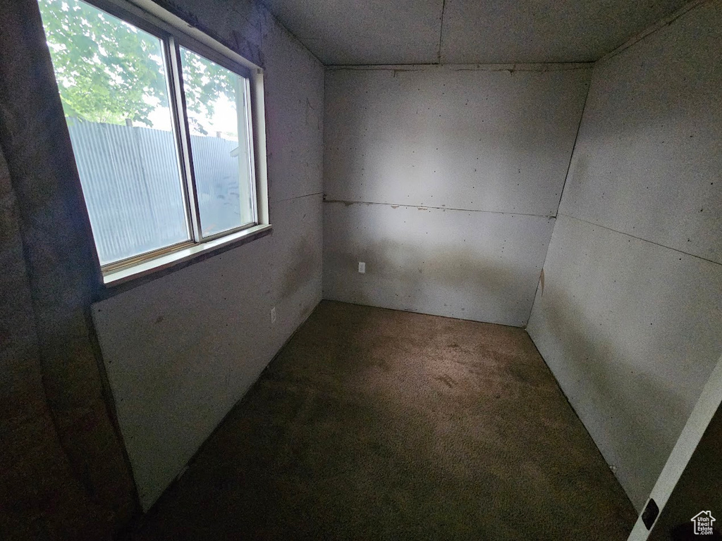 Spare room featuring carpet floors