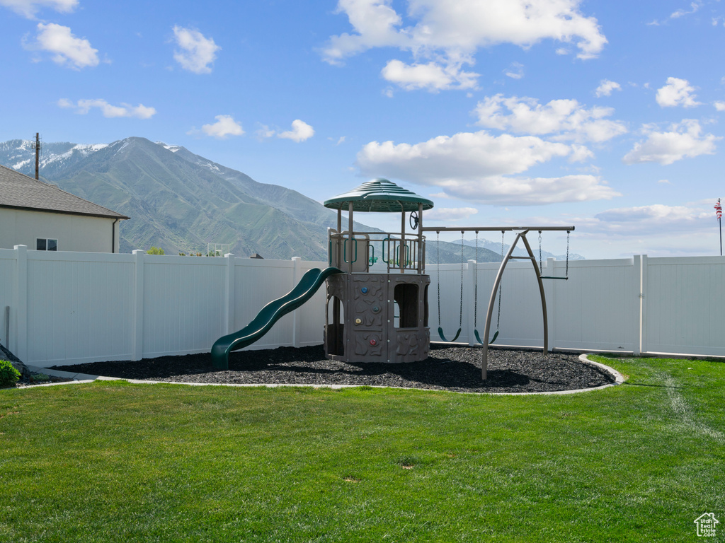 Community play area with a mountain view