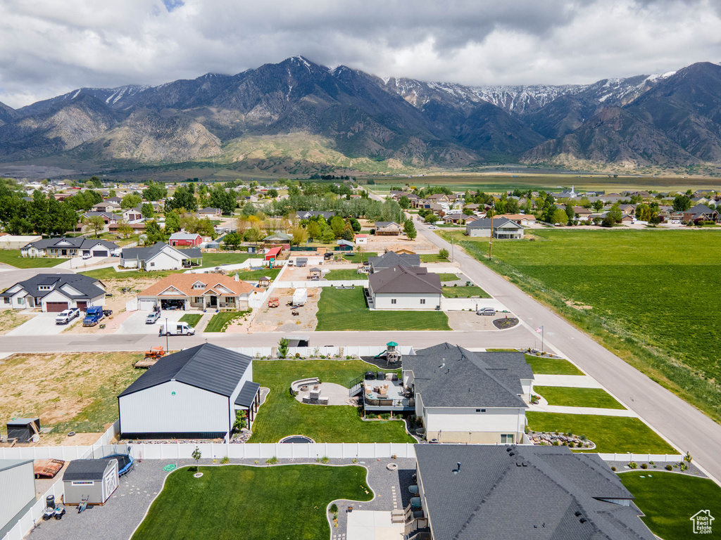 Aerial perspective of suburban area with a mountain backdrop