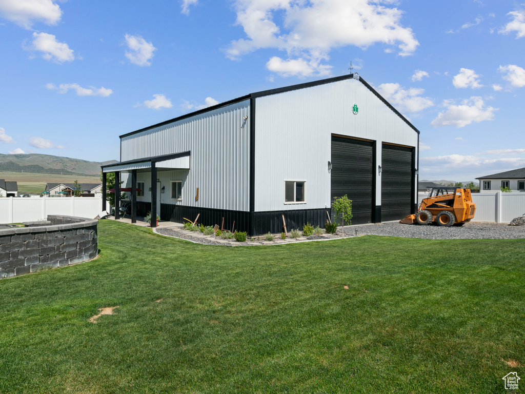 View of outbuilding featuring an outdoor structure