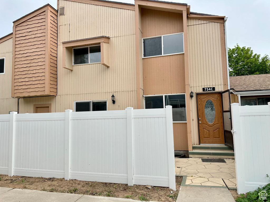 View of front facade with fence