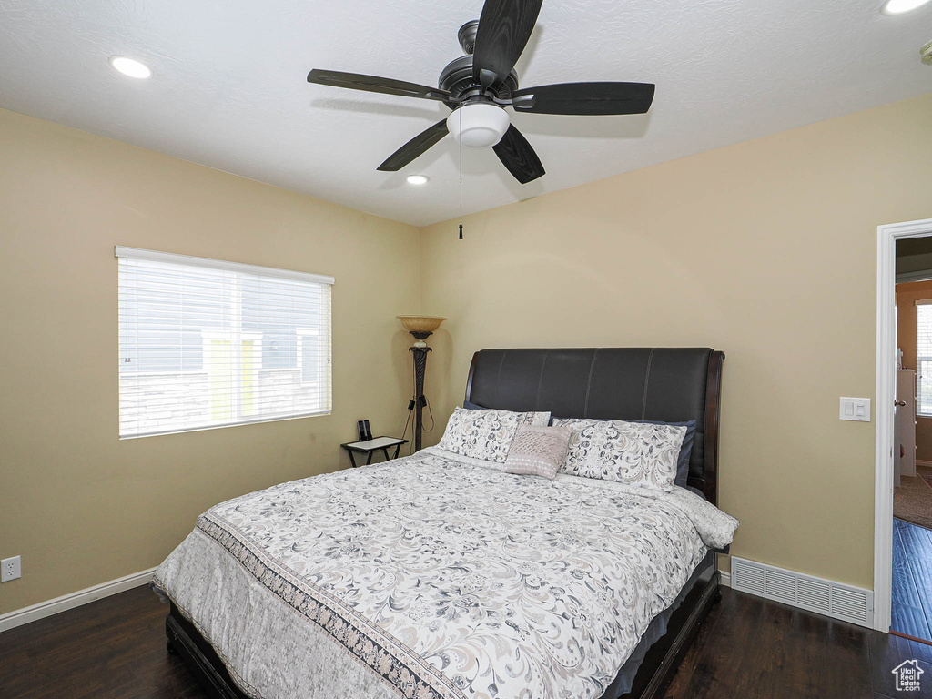 Bedroom with baseboards, wood finished floors, recessed lighting, and ceiling fan