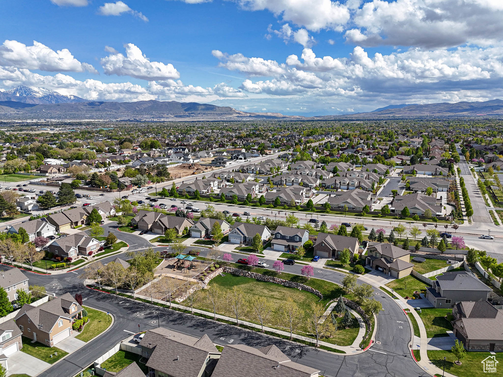 Aerial view of residential area with a mountain backdrop