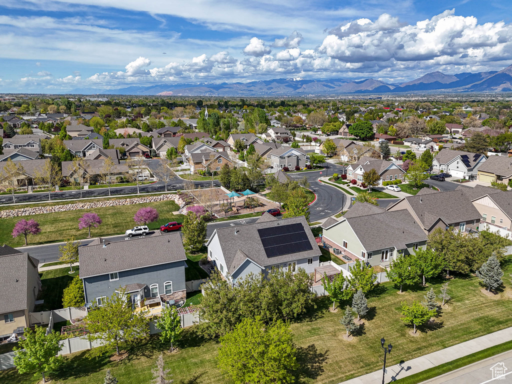 Aerial view of residential area with a mountainous background
