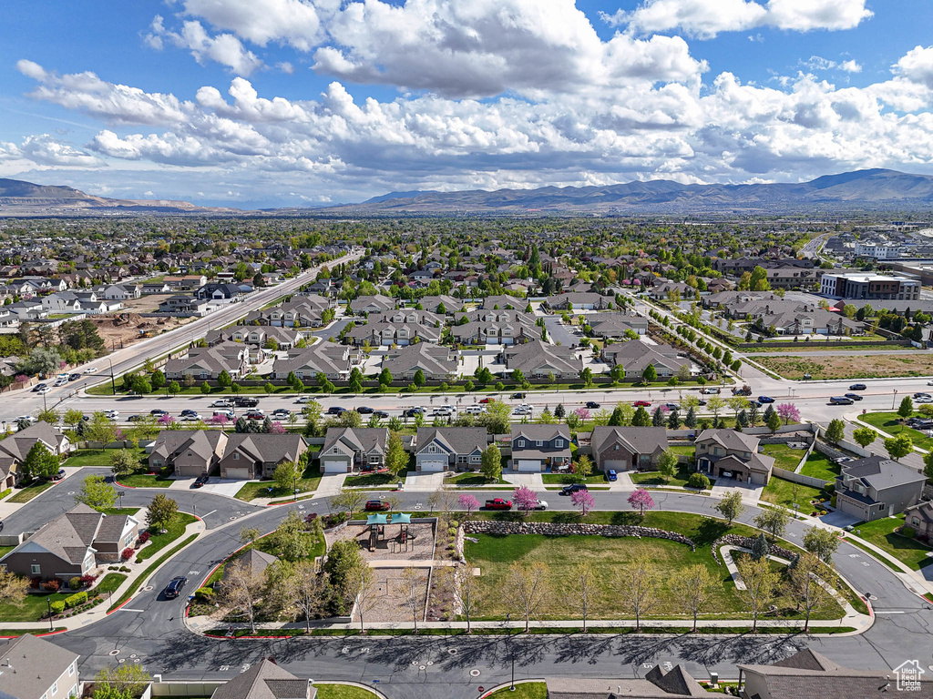 Aerial view of residential area with a mountainous background