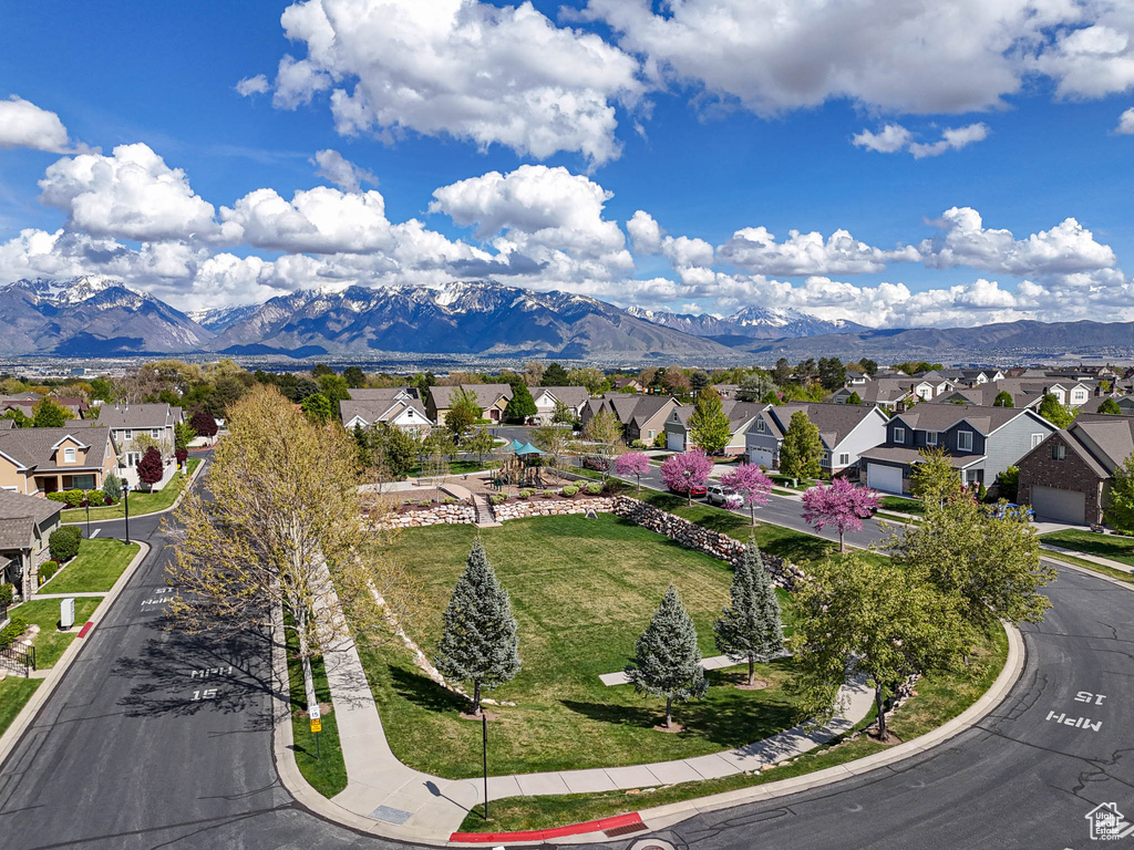Aerial view of residential area featuring mountains