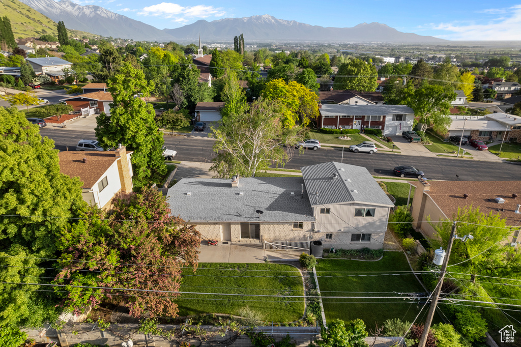 Aerial view of residential area with mountains