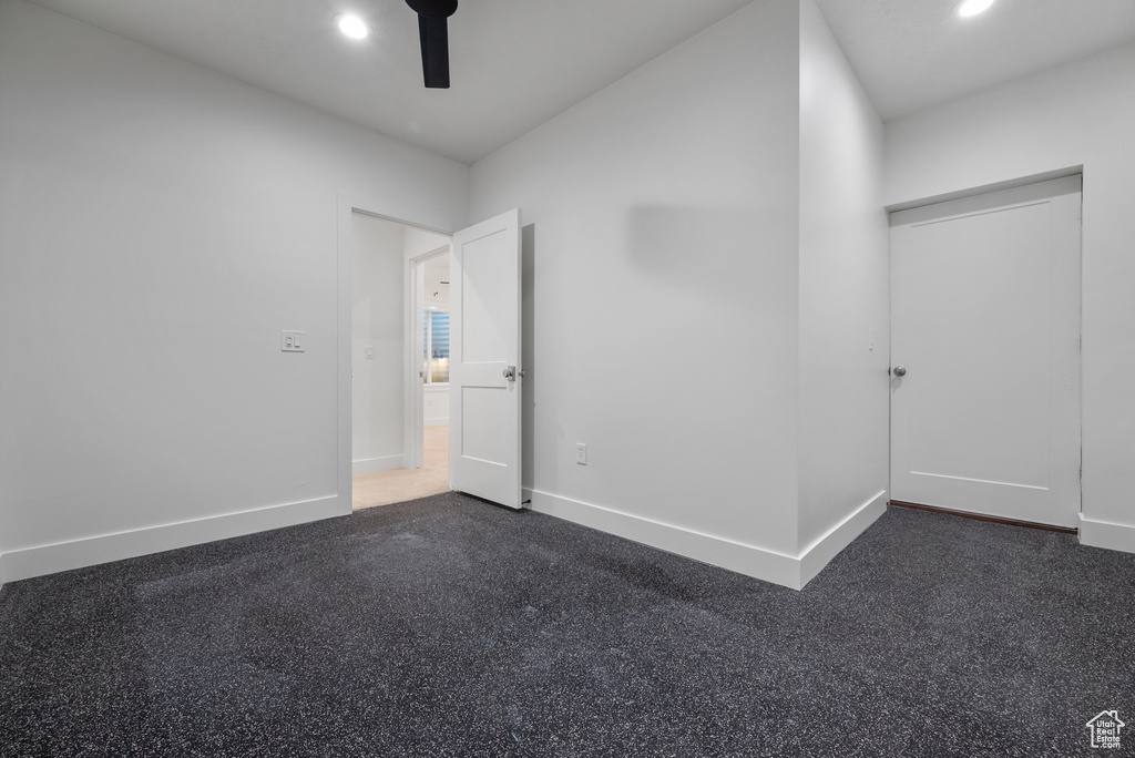 Spare room featuring ceiling fan, recessed lighting, and baseboards