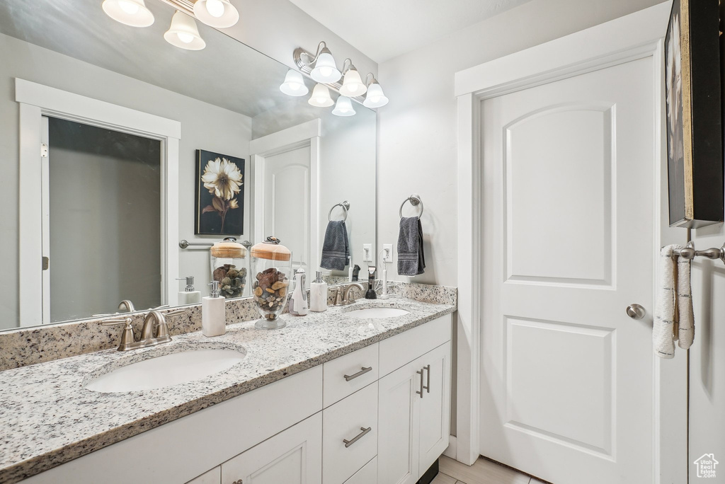 Full bathroom with double vanity