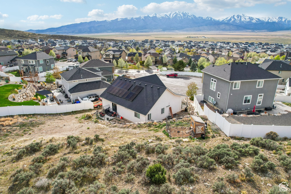 Aerial perspective of suburban area featuring mountains