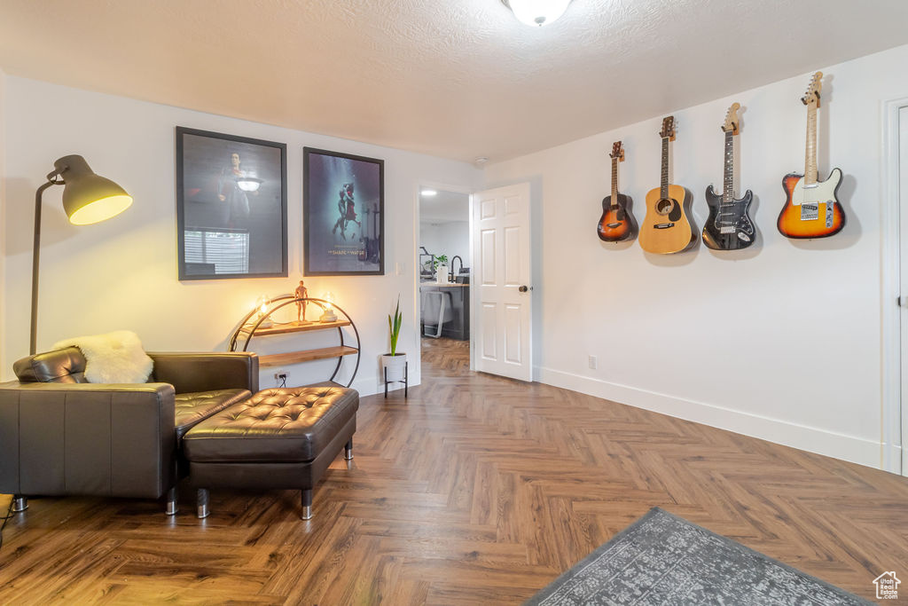 Living area featuring baseboards